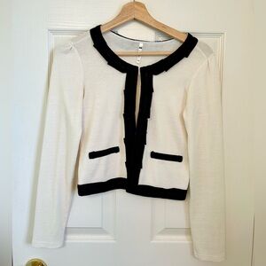 Chanel style cream cardigan with black trimmings